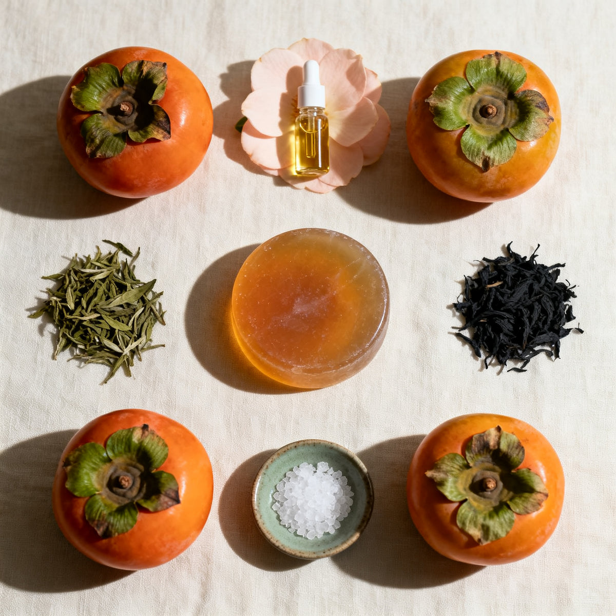 Yuagari soap bar surrounded by persimmon, green tea, camellia and sea salt